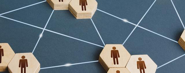 Network of lines and wooden blocks with perosnen icons