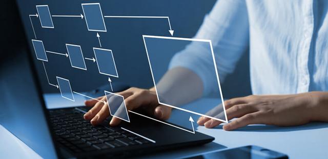 Woman at a laptop with floating box graphic